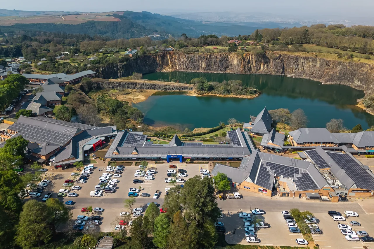 Hilton Quarry Shopping Centre rooftop solar array, aerial view over the quarry, Hilton